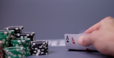 pocket ace with poker chips